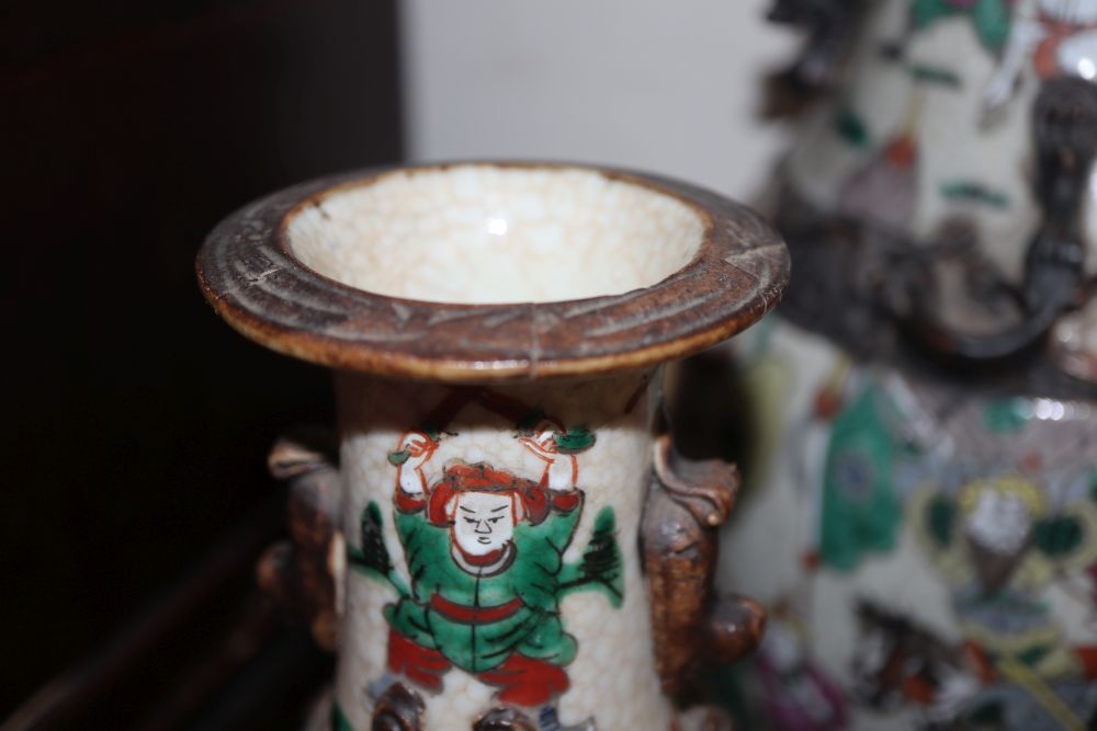 A large Chinese crackleware vase, two smaller vases and two lidded jars, tallest 35cm